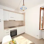 Corte Vezzola Trilocale Tommaso דירה פואניאגו